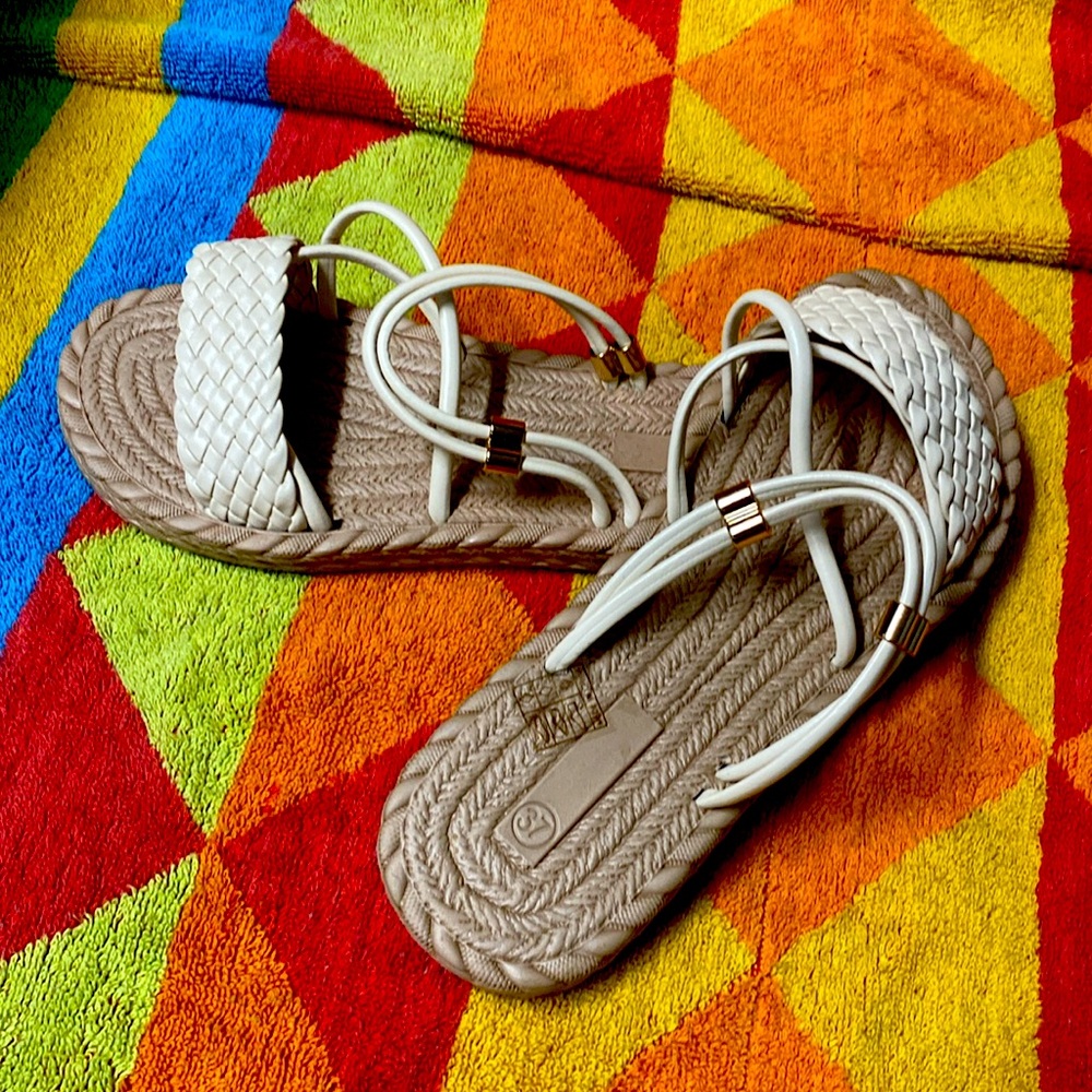 Stylish nude braided flat sandals